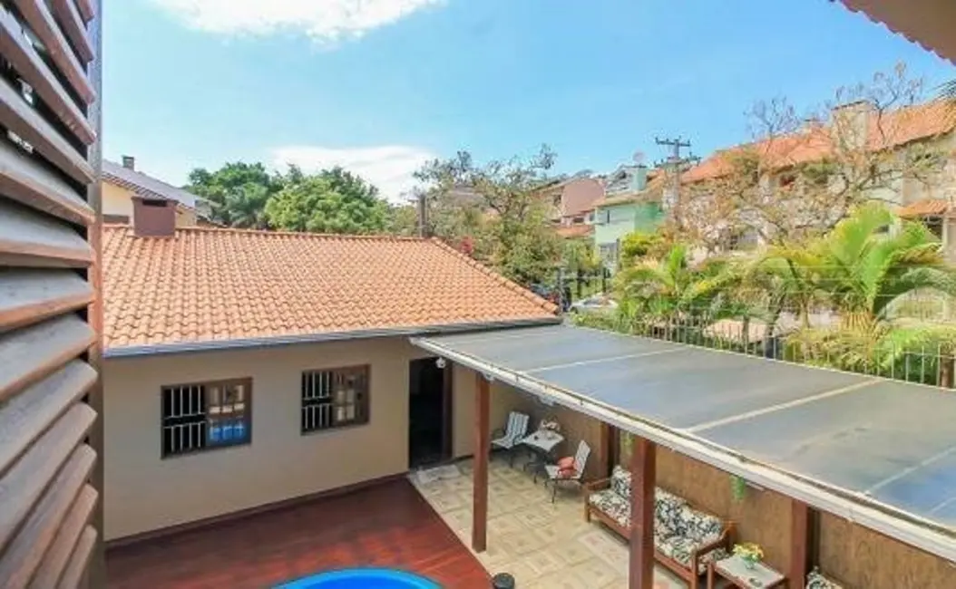 Casa com 4 quartos à venda, 258m2 em Espírito Santo, Porto Alegre - RS - imagem 5 Foto 5 de Casa com 4 quartos à venda, 258m2 em Espírito Santo, Porto Alegre - RS