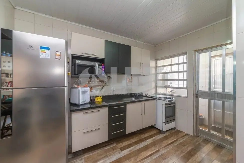 Foto 3 de Casa com 4 quartos à venda, 299m2 em Santana, Porto Alegre - RS