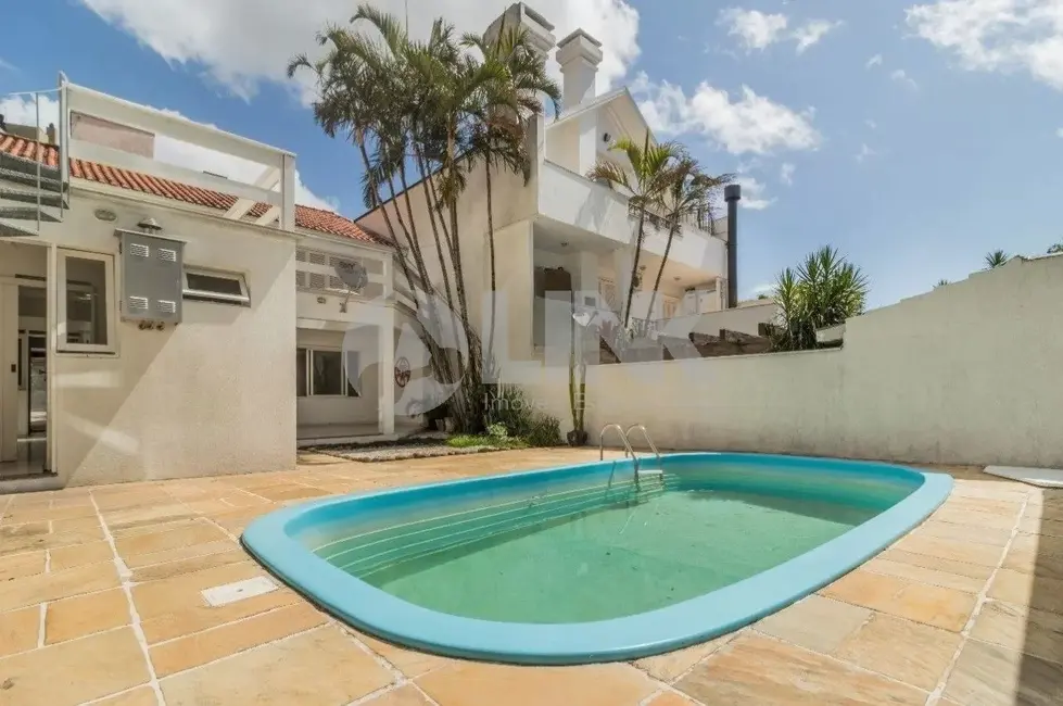 Casa com 4 quartos à venda, 250m2 em Menino Deus, Porto Alegre - RS - imagem 1 Foto 1 de Casa com 4 quartos à venda, 250m2 em Menino Deus, Porto Alegre - RS