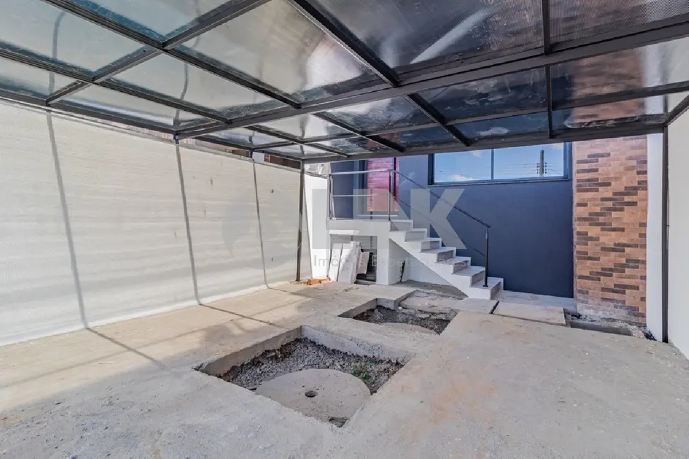 Foto 2 de Casa com 3 quartos à venda, 210m2 em Chácara das Pedras, Porto Alegre - RS