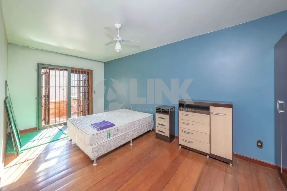 Casa com 3 quartos à venda, 262m2 em Auxiliadora, Porto Alegre - RS - imagem 8 Foto 8 de Casa com 3 quartos à venda, 262m2 em Auxiliadora, Porto Alegre - RS