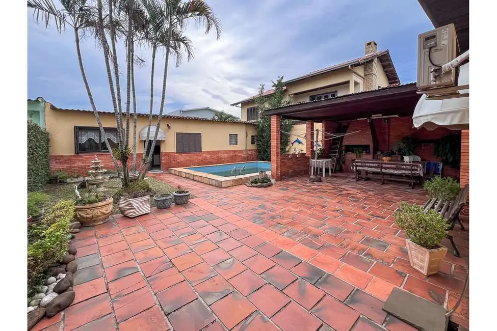 Casa com 3 quartos à venda, 119m2 em Igara, Canoas - RS - imagem 9 Foto 9 de Casa com 3 quartos à venda, 119m2 em Igara, Canoas - RS