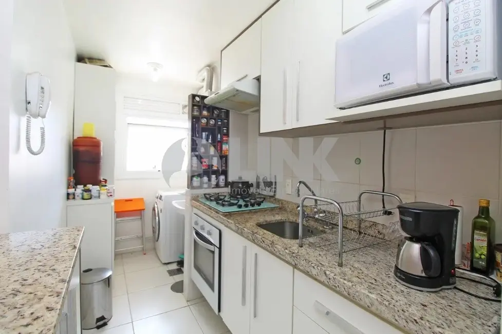 Apartamento com 2 quartos à venda, 63m2 em Passo da Areia, Porto Alegre - RS - imagem 8 Foto 8 de Apartamento com 2 quartos à venda, 63m2 em Passo da Areia, Porto Alegre - RS