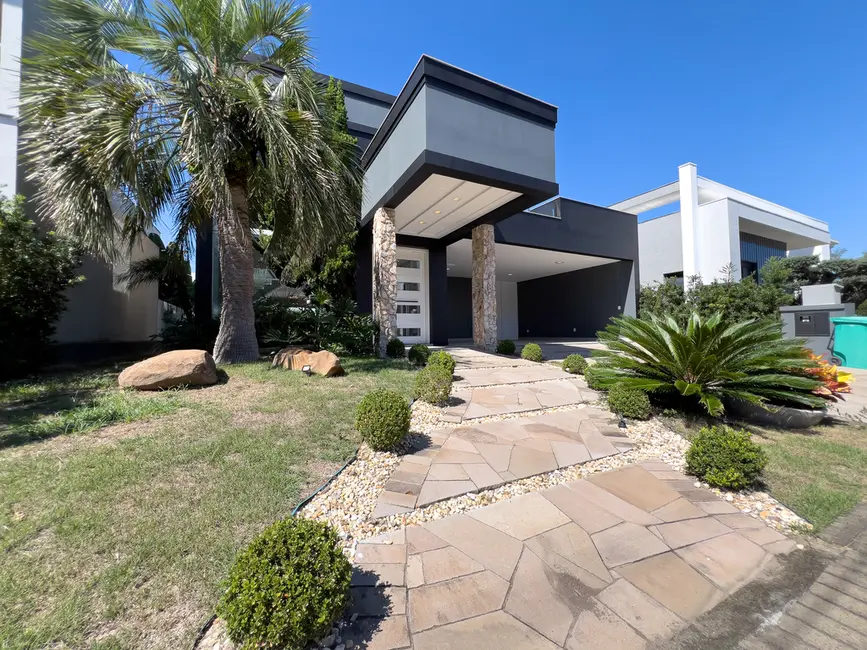 Casa de Condomínio com 4 quartos à venda, 336m2 em Capao Da Canoa - RS - imagem 3 Foto 3 de Casa de Condomínio com 4 quartos à venda, 336m2 em Capao Da Canoa - RS