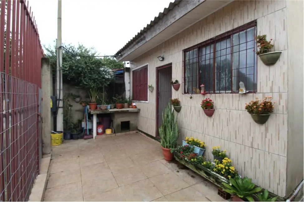 Foto 3 de Casa com 2 quartos à venda, 130m2 em Mário Quintana, Porto Alegre - RS