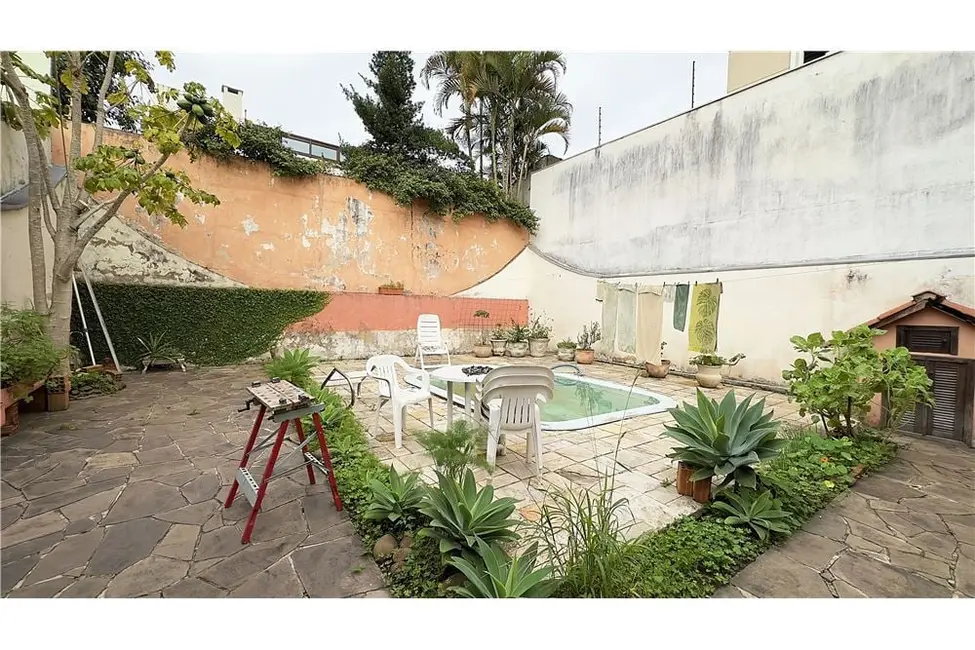 Casa com 3 quartos à venda, 300m2 em Passo da Areia, Porto Alegre - RS - imagem 6 Foto 6 de Casa com 3 quartos à venda, 300m2 em Passo da Areia, Porto Alegre - RS