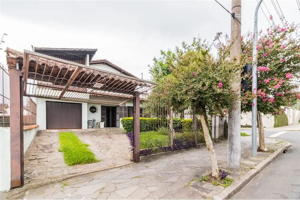 Foto 3 de Casa com 4 quartos à venda, 313m2 em Cavalhada, Porto Alegre - RS