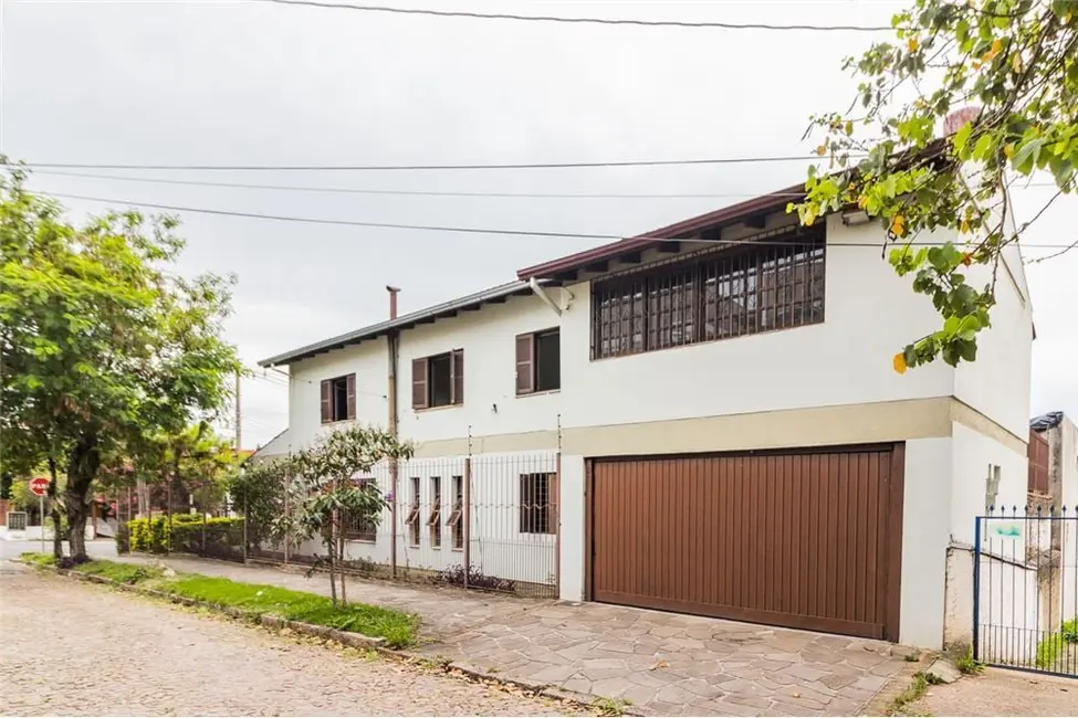 Foto 8 de Casa com 4 quartos à venda, 313m2 em Cavalhada, Porto Alegre - RS