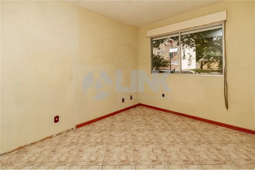 Apartamento com 2 quartos à venda, 52m2 em Santo Antônio, Porto Alegre - RS - imagem 8 Foto 8 de Apartamento com 2 quartos à venda, 52m2 em Santo Antônio, Porto Alegre - RS