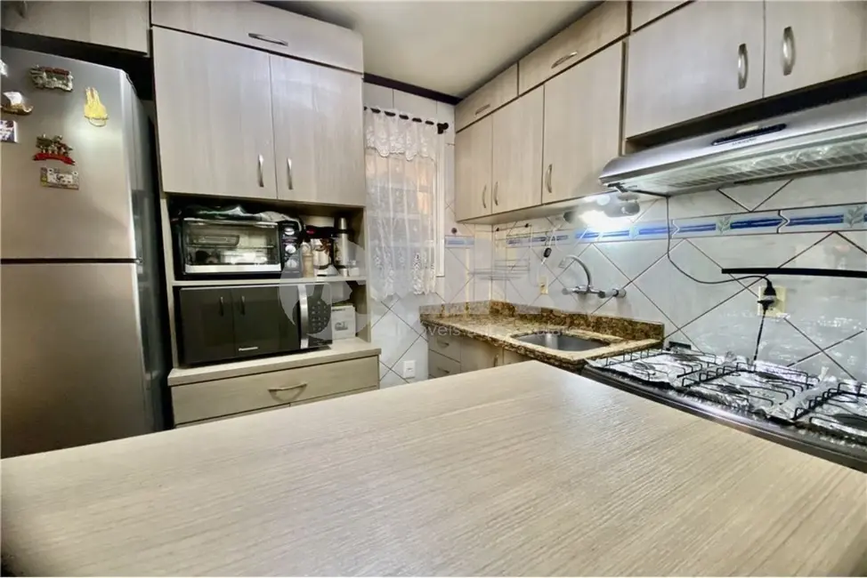 Casa de Condomínio com 2 quartos à venda, 68m2 em Jardim Itu, Porto Alegre - RS - imagem 3 Foto 3 de Casa de Condomínio com 2 quartos à venda, 68m2 em Jardim Itu, Porto Alegre - RS