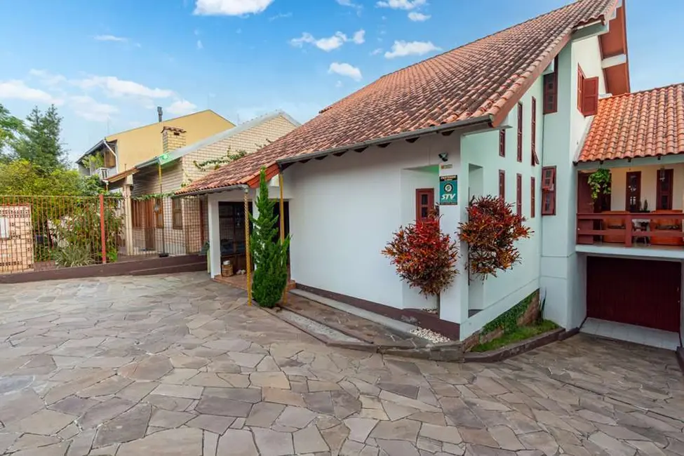 Foto 1 de Casa com 4 quartos à venda, 203m2 em Nossa Senhora das Graças, Canoas - RS