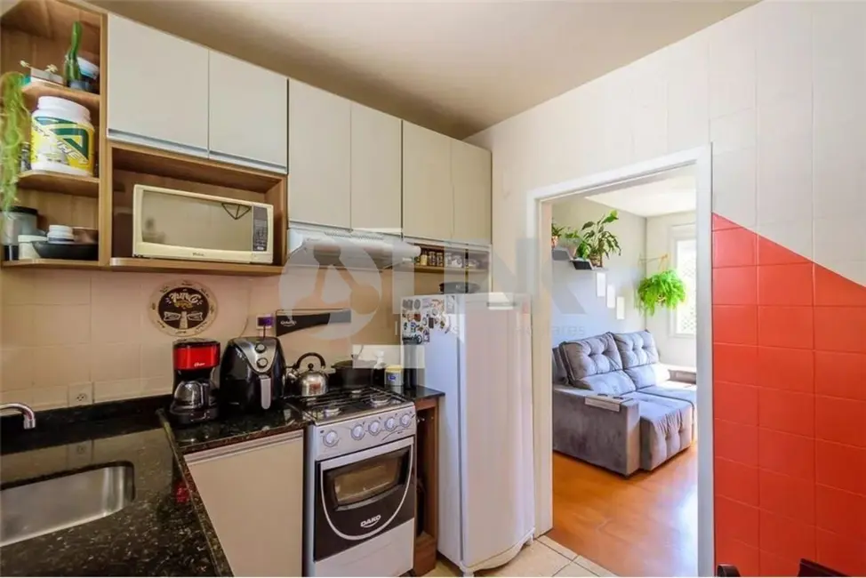 Foto 4 de Apartamento com 2 quartos à venda, 49m2 em Santo Antônio, Porto Alegre - RS