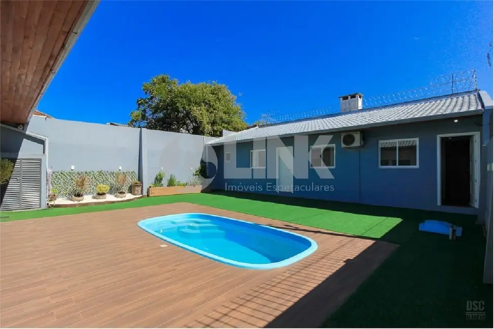 Foto 2 de Casa com 3 quartos à venda, 207m2 em Teresópolis, Porto Alegre - RS
