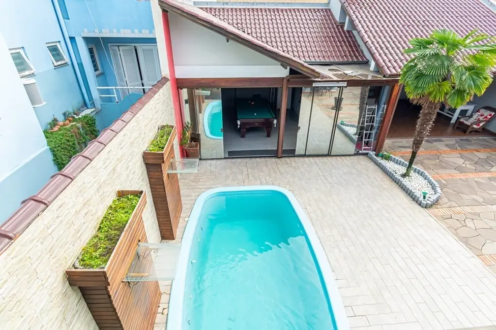 Casa com 4 quartos à venda, 220m2 em São José, Canoas - RS - imagem 4 Foto 4 de Casa com 4 quartos à venda, 220m2 em São José, Canoas - RS