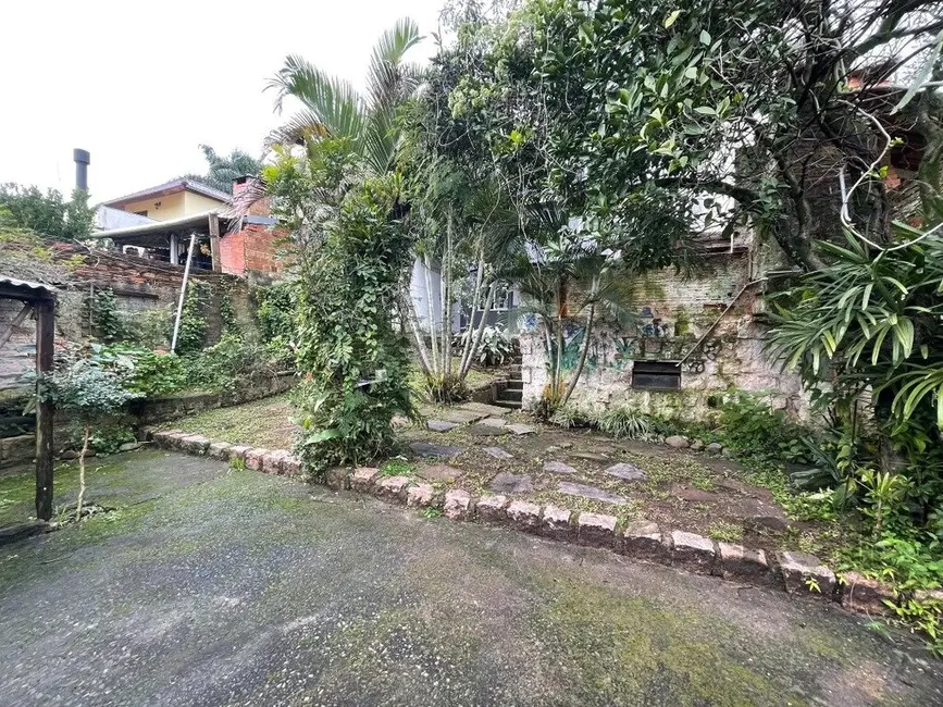 Foto 1 de Casa com 4 quartos à venda, 280m2 em Santa Tereza, Porto Alegre - RS