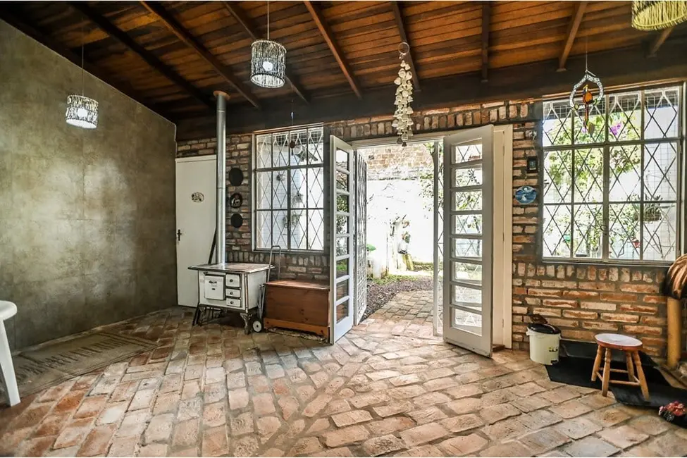 Casa com 3 quartos à venda, 413m2 em Santa Tereza, Porto Alegre - RS - imagem 5 Foto 5 de Casa com 3 quartos à venda, 413m2 em Santa Tereza, Porto Alegre - RS