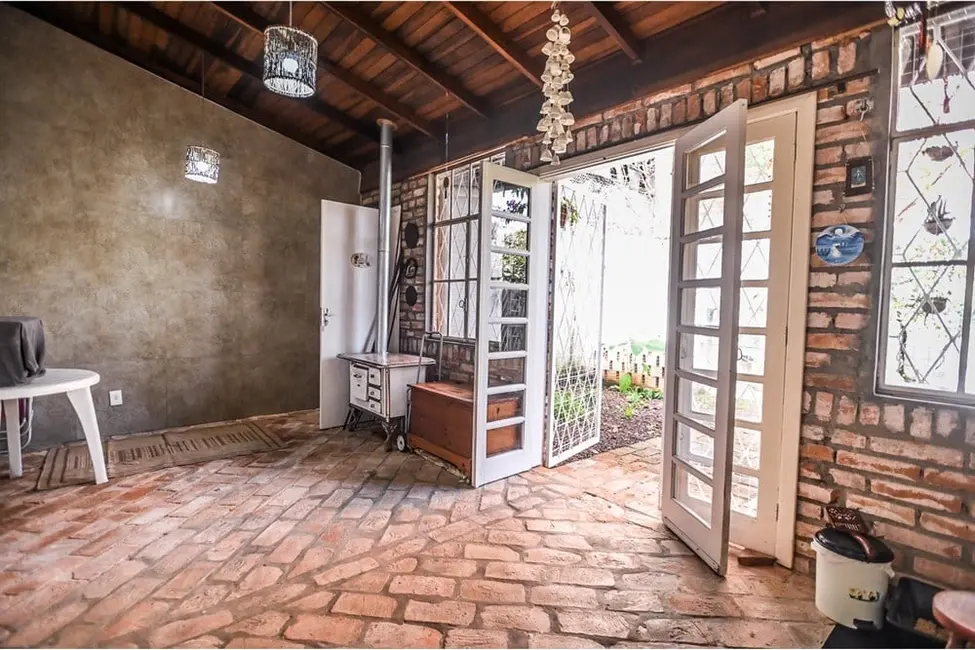 Casa com 3 quartos à venda, 413m2 em Santa Tereza, Porto Alegre - RS - imagem 7 Foto 7 de Casa com 3 quartos à venda, 413m2 em Santa Tereza, Porto Alegre - RS