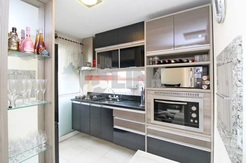 Foto 9 de Apartamento com 2 quartos à venda, 62m2 em Passo da Areia, Porto Alegre - RS