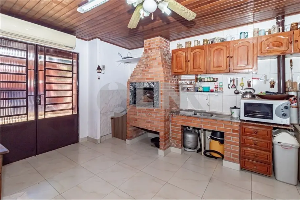 Casa com 3 quartos à venda, 180m2 em Parque Santa Fé, Porto Alegre - RS - imagem 6 Foto 6 de Casa com 3 quartos à venda, 180m2 em Parque Santa Fé, Porto Alegre - RS