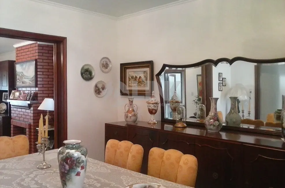 Foto 1 de Casa com 4 quartos à venda, 303m2 em Jardim Lindóia, Porto Alegre - RS