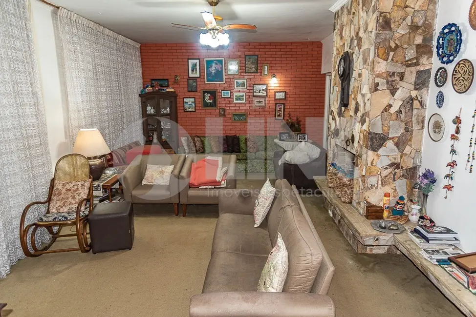 Foto 1 de Casa com 3 quartos à venda, 304m2 em Jardim Lindóia, Porto Alegre - RS