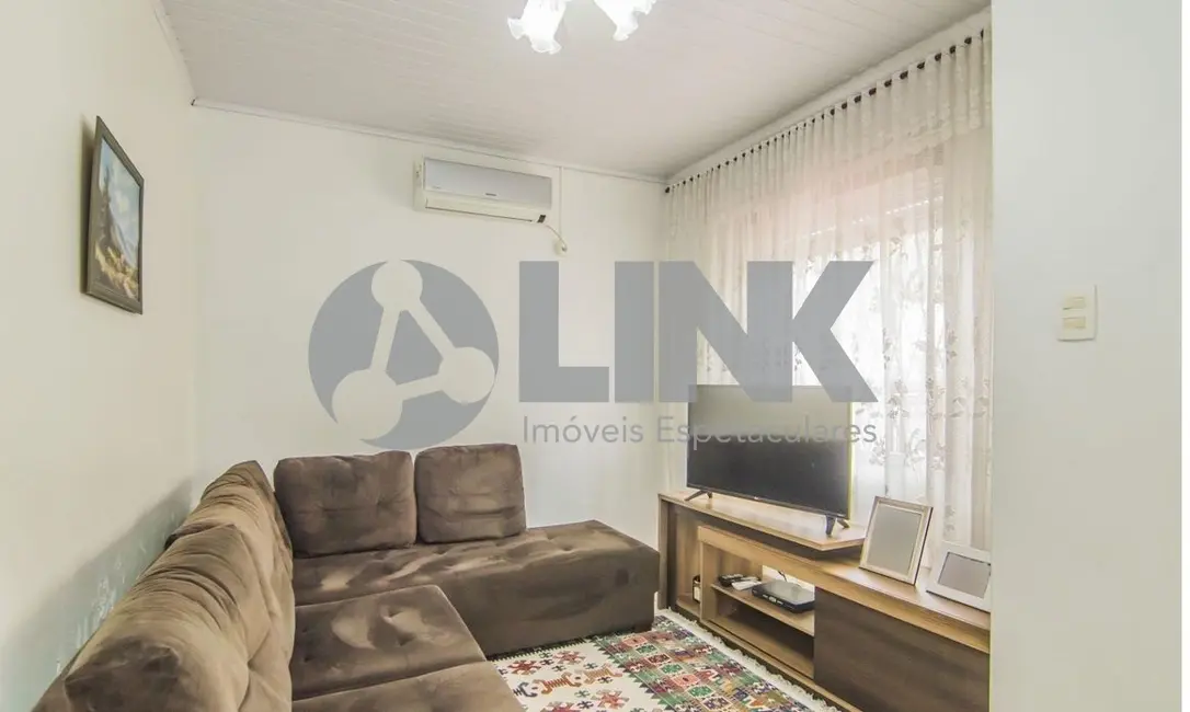 Foto 1 de Casa com 3 quartos à venda, 90m2 em Santa Maria Goretti, Porto Alegre - RS