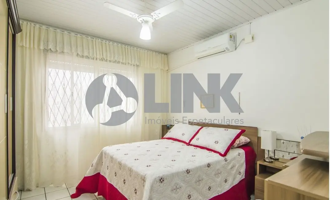 Casa com 3 quartos à venda, 90m2 em Santa Maria Goretti, Porto Alegre - RS - imagem 4 Foto 4 de Casa com 3 quartos à venda, 90m2 em Santa Maria Goretti, Porto Alegre - RS