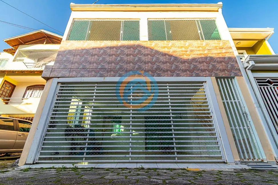 Sobrado com 3 quartos à venda, 100m2 em Sítio Cercado, Curitiba - PR - imagem 1 Foto 1 de Sobrado com 3 quartos à venda, 100m2 em Sítio Cercado, Curitiba - PR