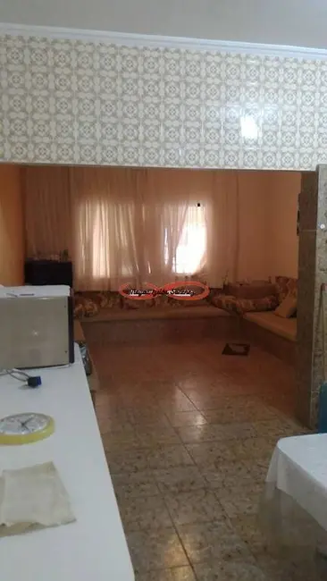 Foto 2 de Casa com 3 quartos à venda, 145m2 em Maracanã, Praia Grande - SP