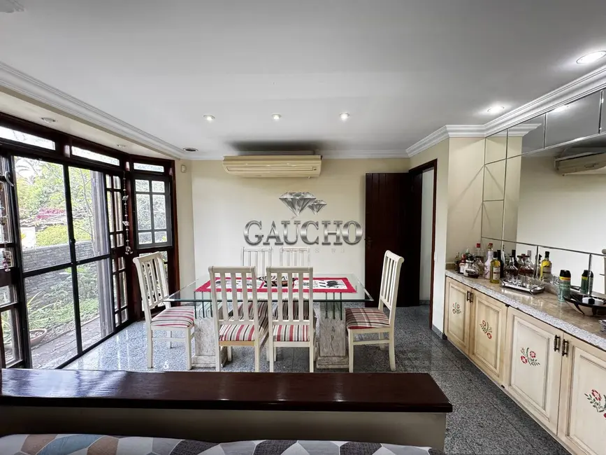 Casa com 5 quartos à venda, 431m2 em Barra da Tijuca, Rio De Janeiro - RJ - imagem 9 Foto 9 de Casa com 5 quartos à venda, 431m2 em Barra da Tijuca, Rio De Janeiro - RJ