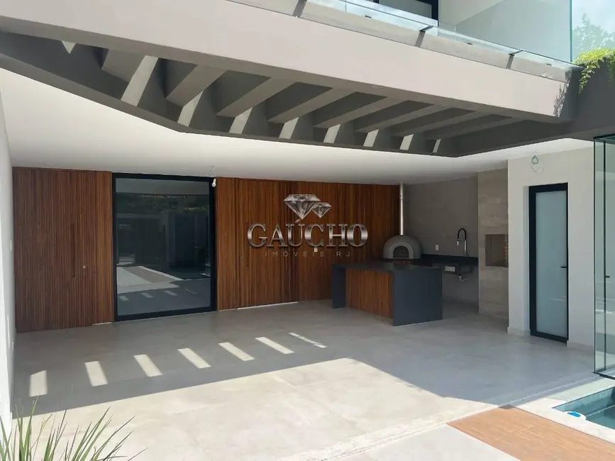 Casa com 4 quartos à venda, 319m2 em Barra da Tijuca, Rio De Janeiro - RJ - imagem 4 Foto 4 de Casa com 4 quartos à venda, 319m2 em Barra da Tijuca, Rio De Janeiro - RJ