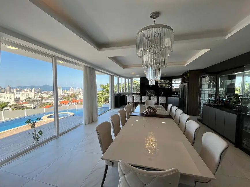 Foto 2 de Casa com 4 quartos à venda em Bosque das Mansões, Sao Jose - SC