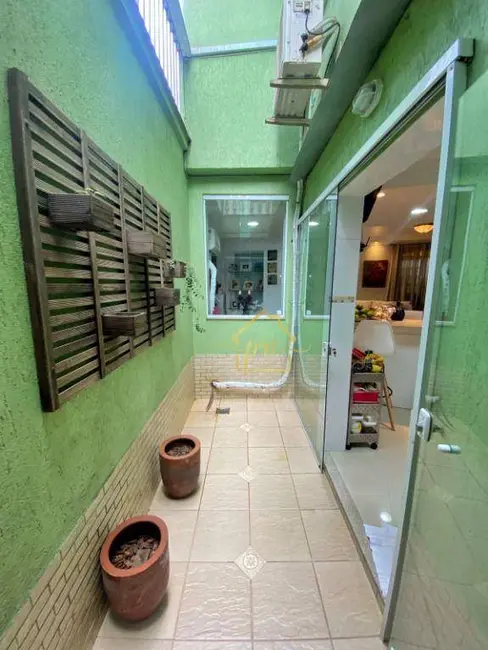 Foto 6 de Casa com 3 quartos à venda, 113m2 em Ponta da Praia, Santos - SP