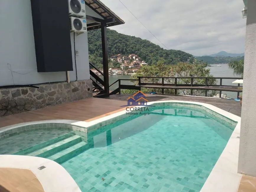 Foto 1 de Casa de Condomínio com 7 quartos para alugar, 600m2 em Itanema (Cunhambebe), Angra Dos Reis - RJ