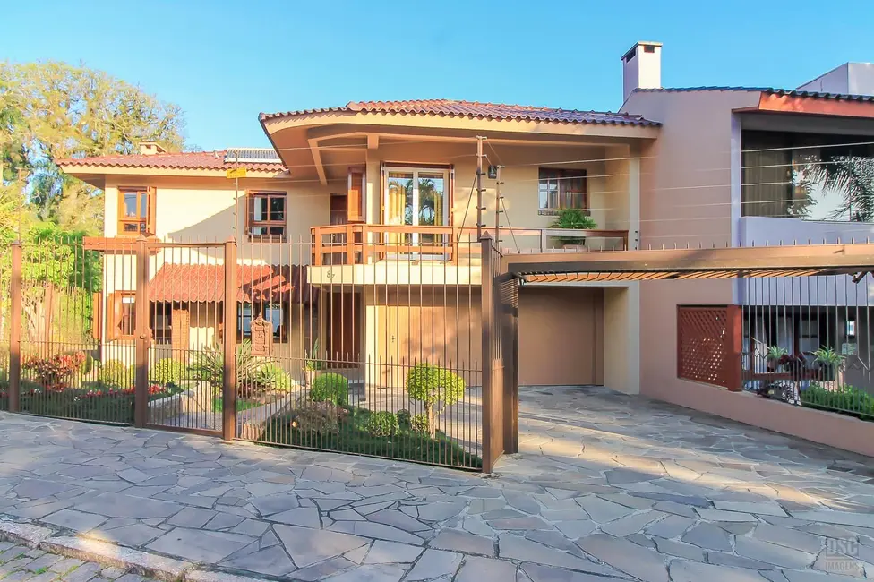 Casa com 4 quartos à venda, 263m2 em Pedra Redonda, Porto Alegre - RS - imagem 2 Foto 2 de Casa com 4 quartos à venda, 263m2 em Pedra Redonda, Porto Alegre - RS