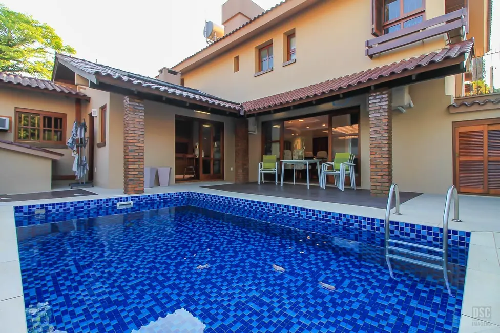 Foto 1 de Casa com 4 quartos à venda, 263m2 em Pedra Redonda, Porto Alegre - RS