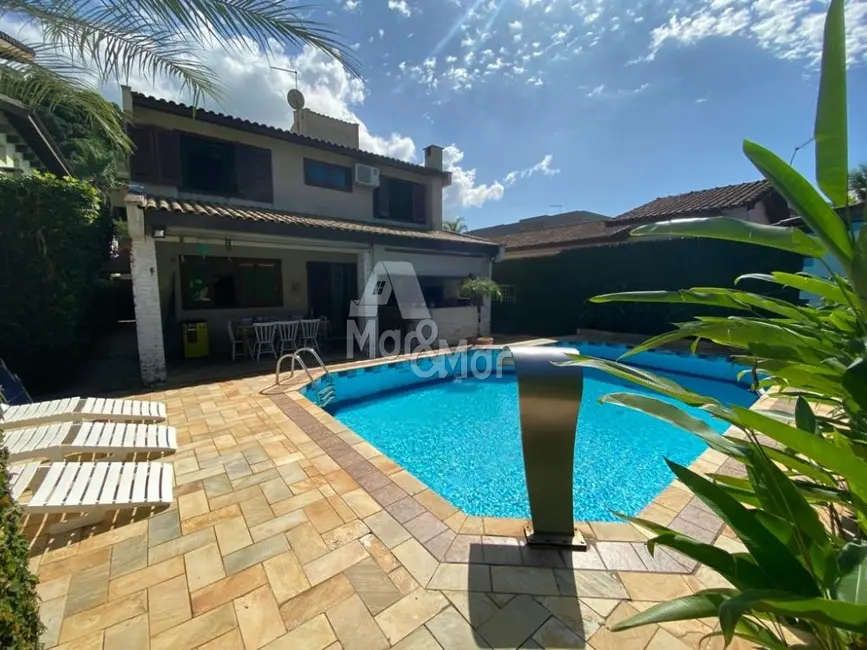 Foto 4 de Casa com 4 quartos à venda, 247m2 em Balneário Praia do Pernambuco, Guaruja - SP
