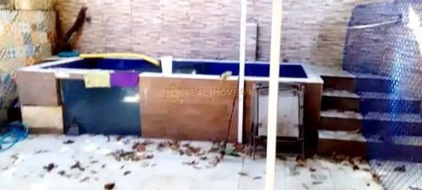 Foto 9 de Casa com 5 quartos à venda, 220m2 em Laranjeiras, Rio De Janeiro - RJ