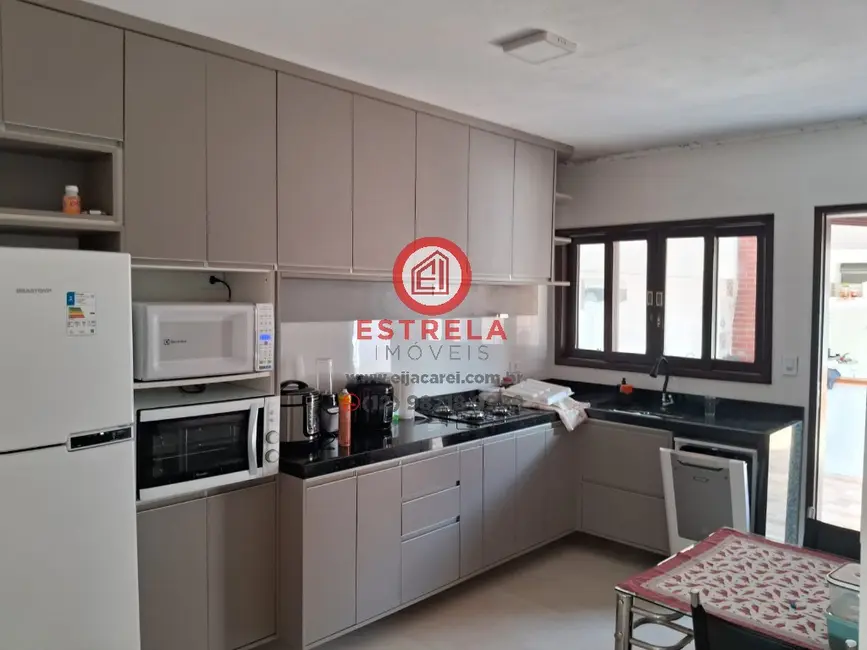 Casa com 3 quartos à venda, 150m2 em Jardim Parnaso, Caraguatatuba - SP - imagem 7 Foto 7 de Casa com 3 quartos à venda, 150m2 em Jardim Parnaso, Caraguatatuba - SP