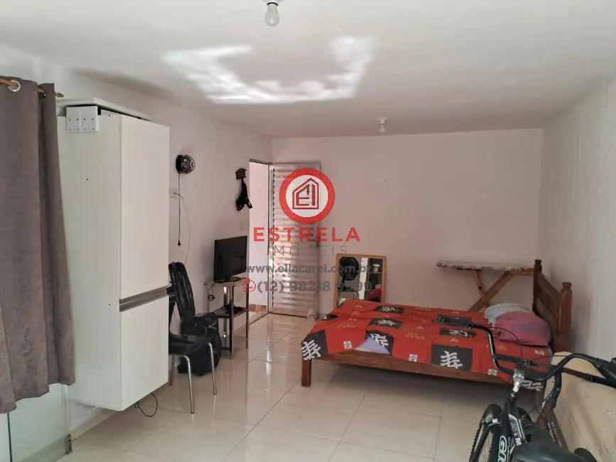 Casa com 3 quartos à venda, 150m2 em Jardim Parnaso, Caraguatatuba - SP - imagem 5 Foto 5 de Casa com 3 quartos à venda, 150m2 em Jardim Parnaso, Caraguatatuba - SP