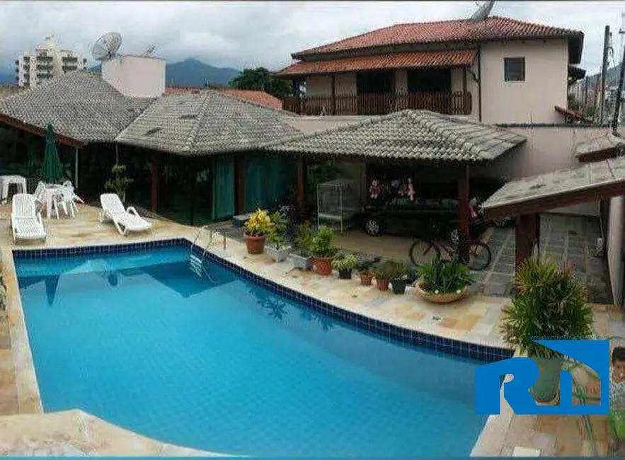 Foto 1 de Casa com 4 quartos à venda, 414m2 em Loteamento Balneário Camburi, Caraguatatuba - SP
