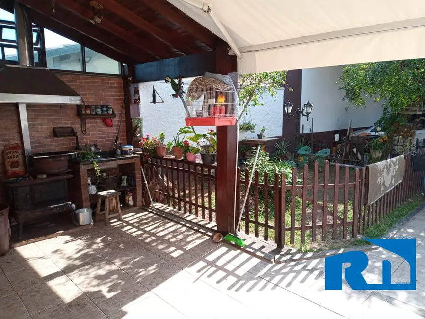 Foto 4 de Casa com 5 quartos à venda, 288m2 em Jardim Nomar, Caraguatatuba - SP