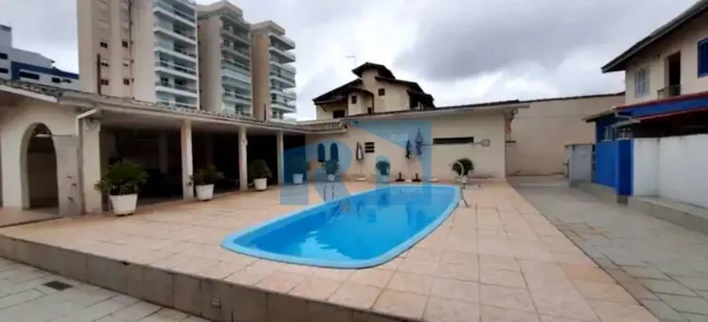 Foto 1 de Casa com 2 quartos à venda, 81m2 em Loteamento Jardim Aruan, Caraguatatuba - SP