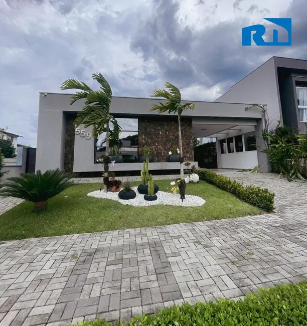 Foto 1 de Casa com 4 quartos à venda, 390m2 em Costa Nova, Caraguatatuba - SP