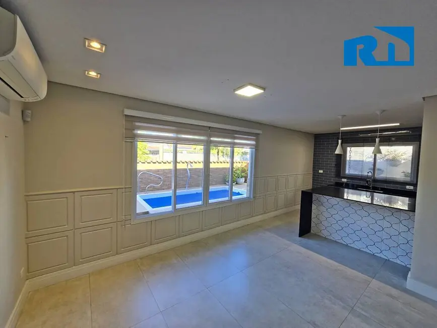 Foto 9 de Casa com 4 quartos à venda, 390m2 em Indaiá, Caraguatatuba - SP