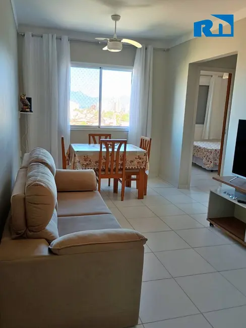 Foto 2 de Apartamento à venda em Martim de Sá, Caraguatatuba - SP