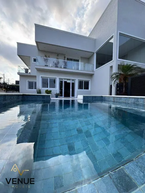 Foto 1 de Casa de Condomínio com 4 quartos à venda, 608m2 em Residencial Real Park, Aruja - SP