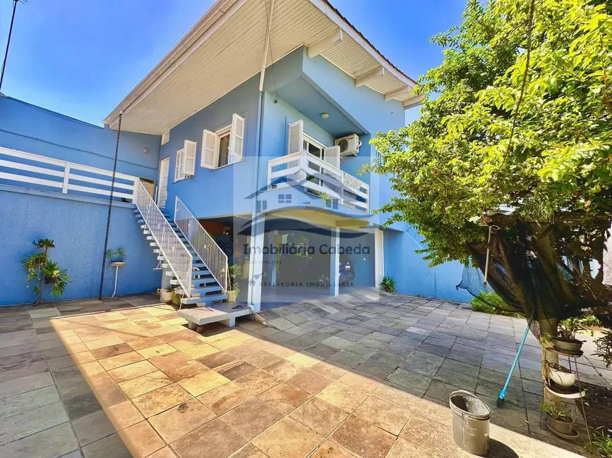 Sobrado com 4 quartos à venda em Santa Catarina, Sapucaia Do Sul - RS - imagem 4 Foto 4 de Sobrado com 4 quartos à venda em Santa Catarina, Sapucaia Do Sul - RS