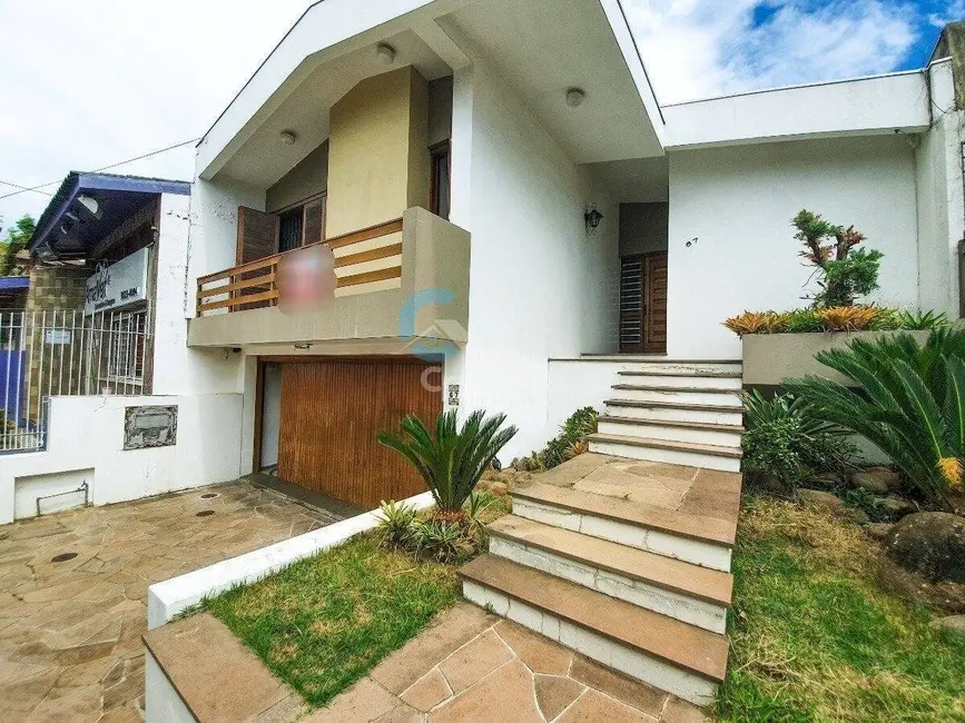 Casa com 3 quartos à venda, 223m2 em Jardim Lindóia, Porto Alegre - RS - imagem 1 Foto 1 de Casa com 3 quartos à venda, 223m2 em Jardim Lindóia, Porto Alegre - RS