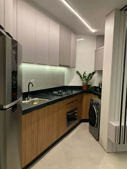 Foto 3 de Apartamento com 2 quartos à venda, 54m2 em Centro, Navegantes - SC